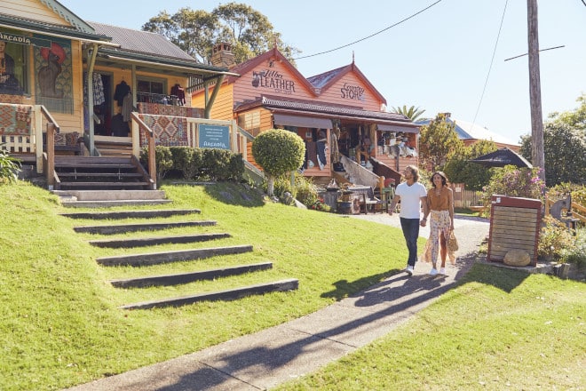 Couple exploring the historic streets of Central Tilba