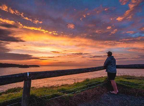Man at sunrise, Melville Point Lookout, Tomakin